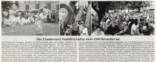 Zeitungsseite Traunsteiner Tagblatt vom 14. Juli 2003: Taekwondo-Vorführung vor Publikum auf dem Traunreuter Stadtplatz, Hüpfburg und voller Biergarten – „Das Traunreuter Stadtfest lockte viele 1000 Besucher an"